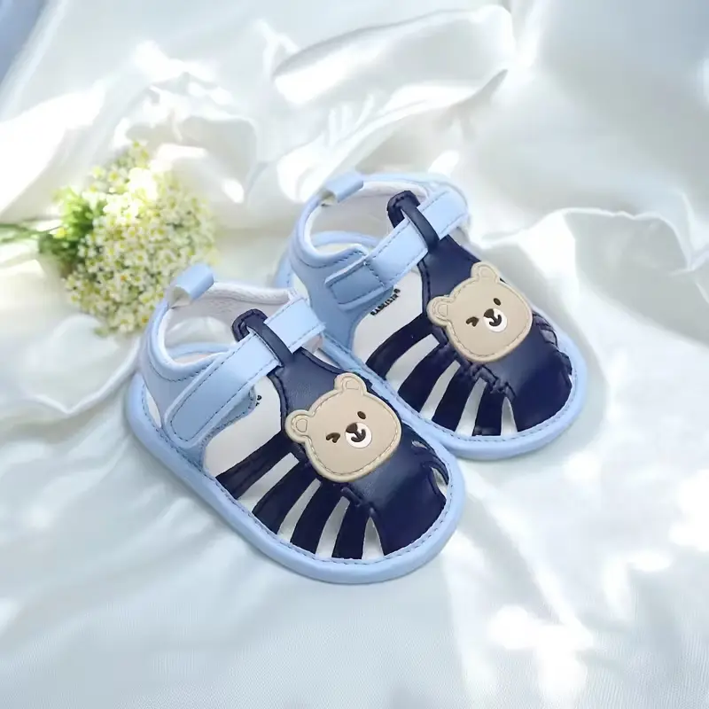 Sandalias de caminar para bebés con suela suave de oso
